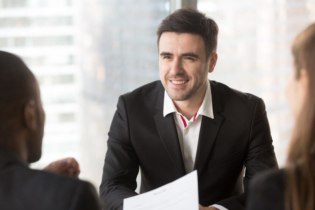 man-focusing-conversation-with-interviewers