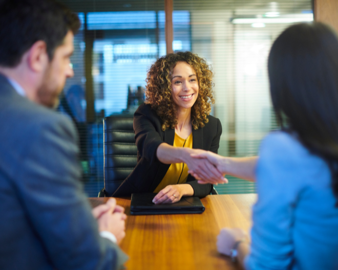 A warm handshake during an interview in Delhi captures the positive outcome of a job meeting, reflecting trust and opportunity.